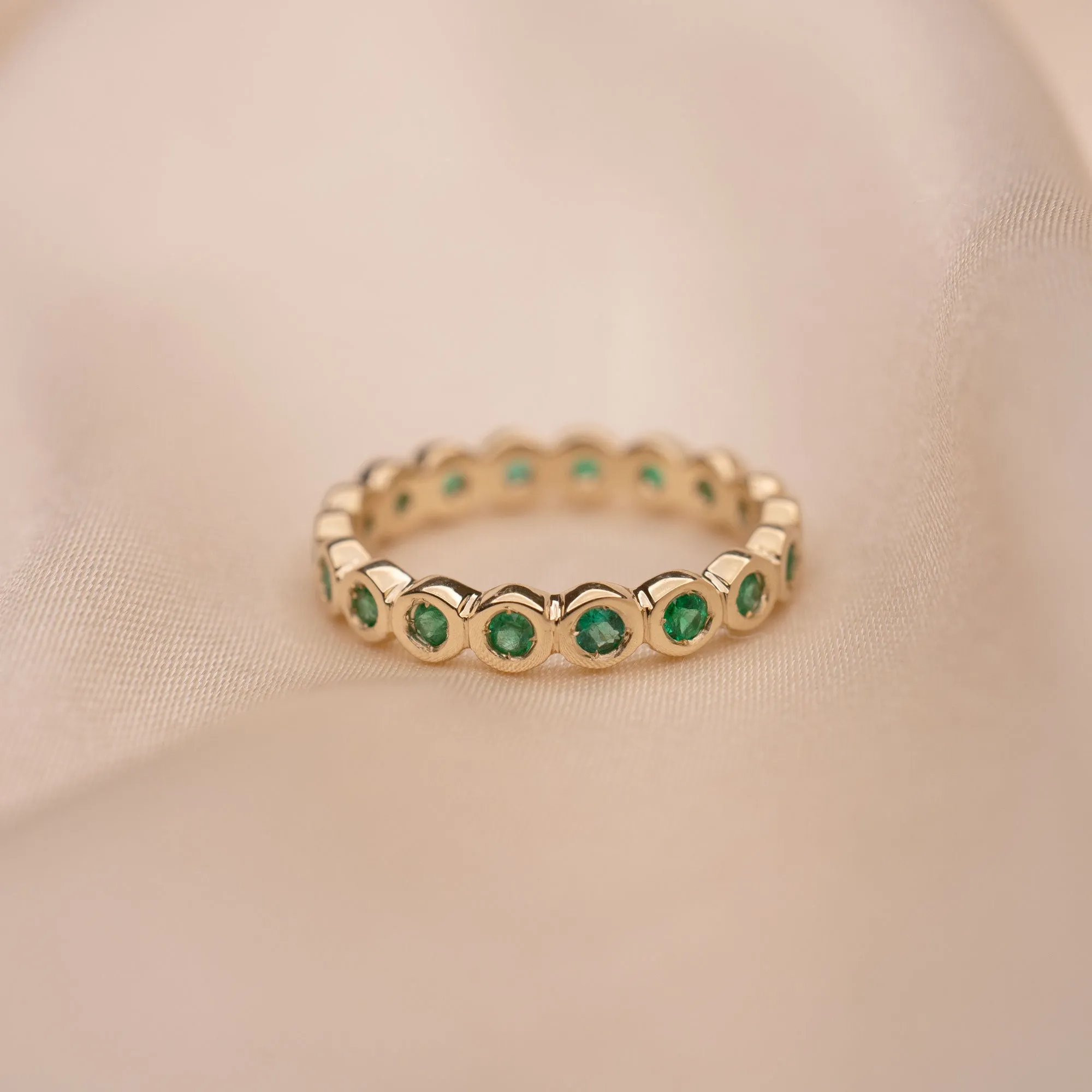 14k Emerald Eternity Band