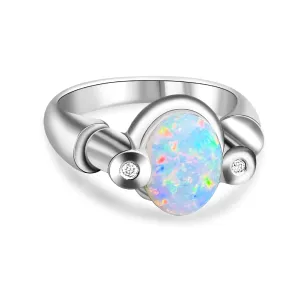 18kt White Gold Crystal Opal 9x7mm and 2 Diamond ring