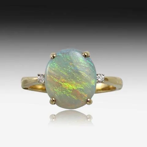 18KT YELLOW GOLD BLACK OPAL RING