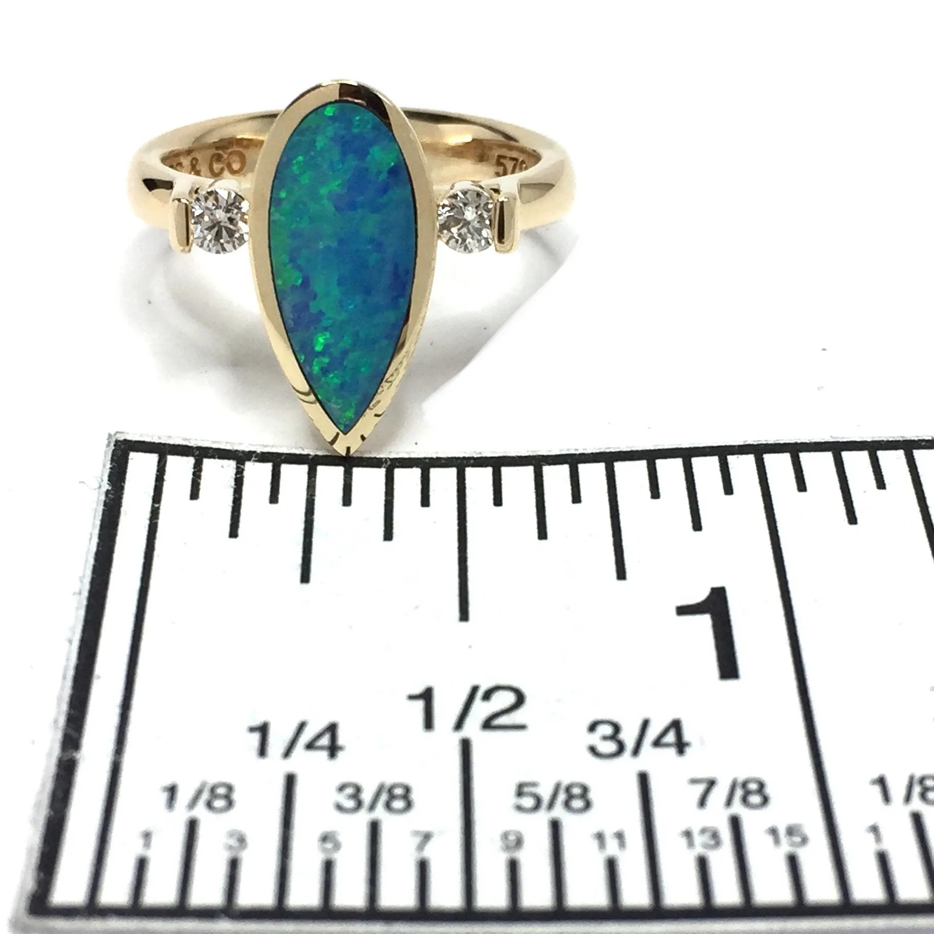 Opal Rings Pear Shape Inlaid Design with .18ctw Round Diamonds