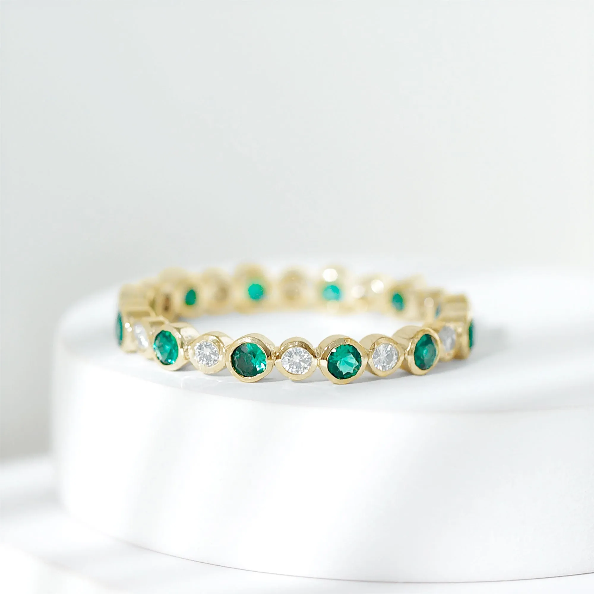 Round Lab Created Emerald Moissanite Eternity Band Ring