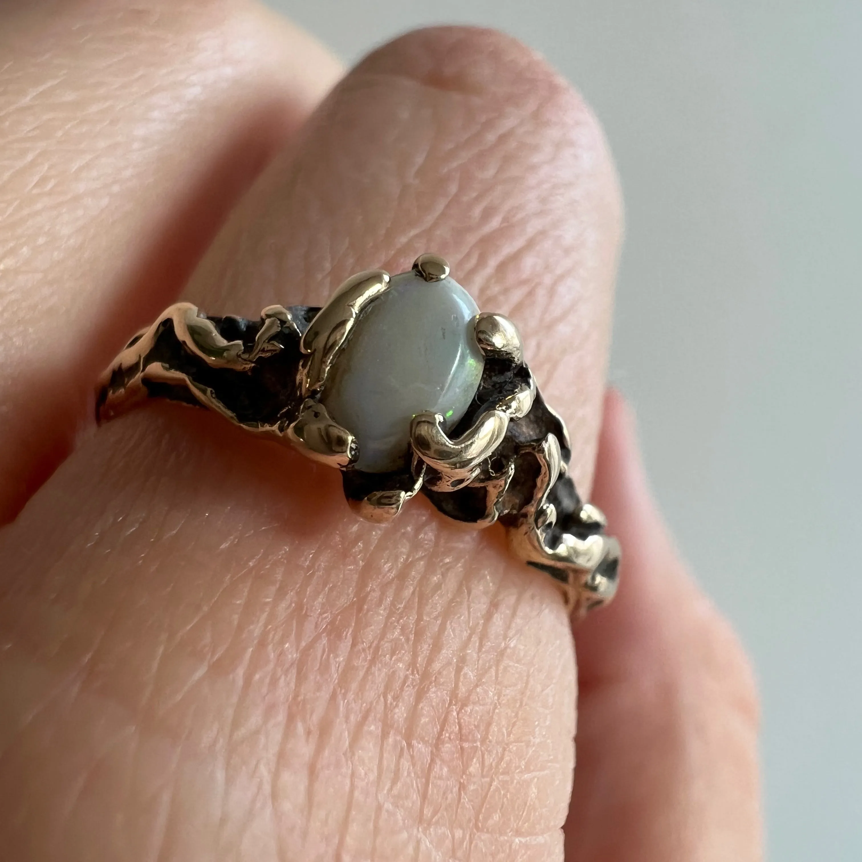 V I N T A G E // barely brutal / 14k yellow gold featuring an opal solitaire / size 7.25 to 7.5